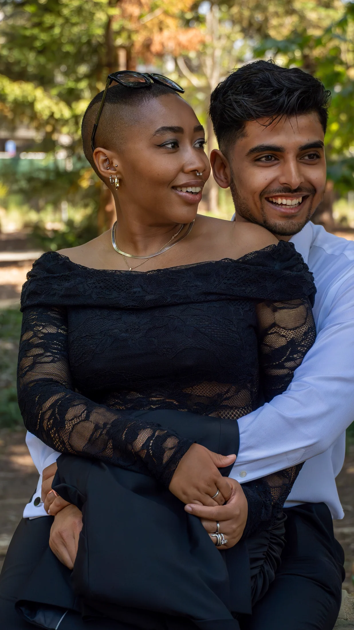 Akshat embracing Jade from behind after their wedding