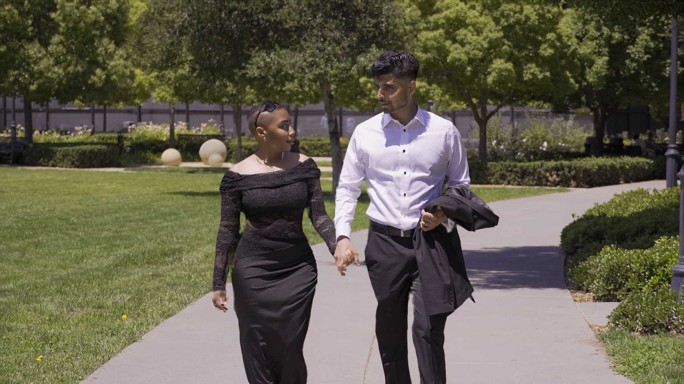 Akshat and Jade walking together after the ceremony